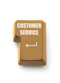 Gold computer enter key labeled customer service over a white background