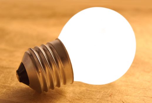 Brightly lit bulb symbolising bright ideas and inspiration