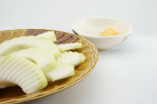 Sliced guava on the plate Brown With plum and chilli.