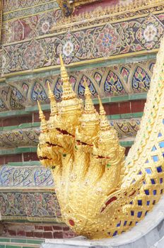 Five naga head mounted on the ladder in the Temple of the Emerald Buddha.