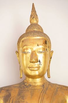 Golden Buddha at Wat Pho in long awaiting restoration. Bangkok, Thailand