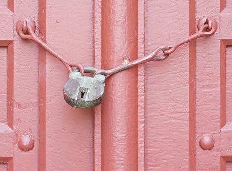 Red door was locked with a old antique door key.