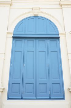 Large blue windows of the building, which is located on the Temple of the Emerald Buddha.