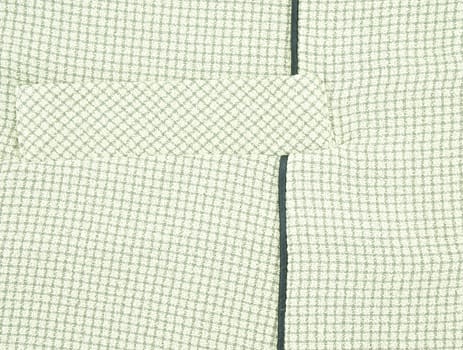 Background of pocket on green shirt textile for woman with square pattern texture.