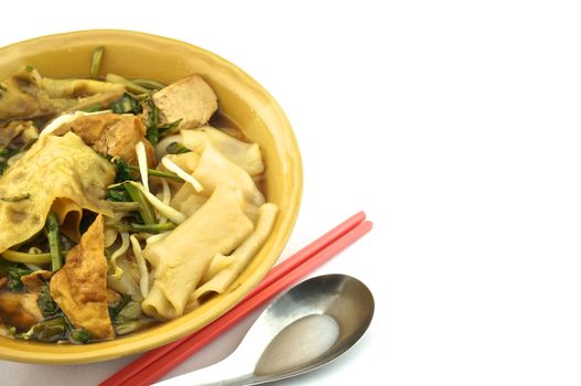 Soup white rice noodle with fried tofu, bean sprouts, morning glory vegetarian for health.