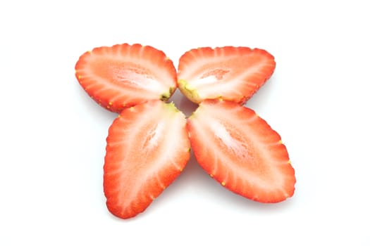 Chip cold red strawberry put like flower isolated with white background.