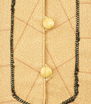 Close up of button and background of brown shirt textile pattern texture