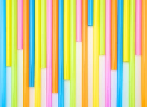 Colorful straight straw put continual as the beautiful background color look like graph.