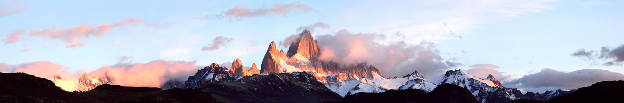 Andes in the fire. Giant panorama of mountain range Fitz Roy, Glaciers National Park Argentina, Patagonia