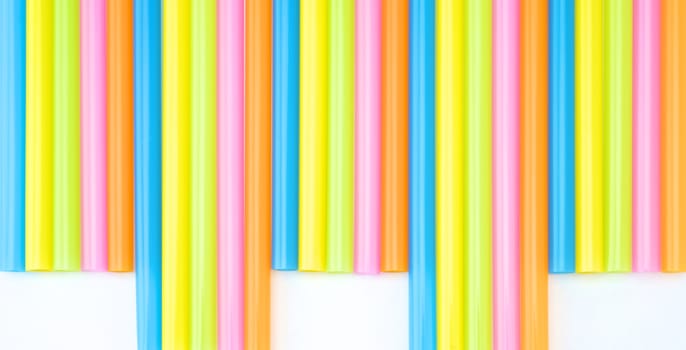 Colorful straight straw put continual as the beautiful background color.