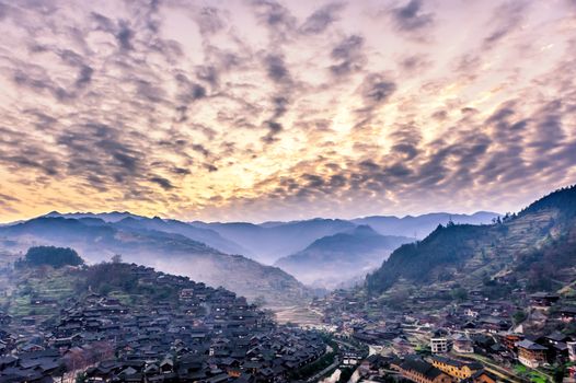 Xijiang miao village, largest village in Guizhou Miao ethnic minority under the morning of sunrise.