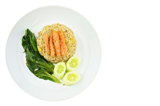 Shrimp fried rice vegetarian with kale, carrots and cucumber on a plate isolated with white background.