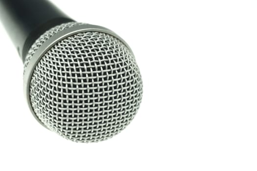 Black and silver microphone for music isolated with white background.