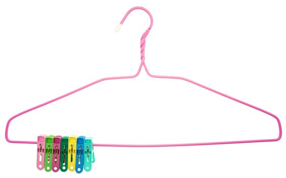 Colorful clothes Pegs clamped to pink hanger isolated with white background.