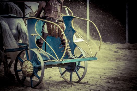 Roman chariot in a fight of gladiators, bloody circus