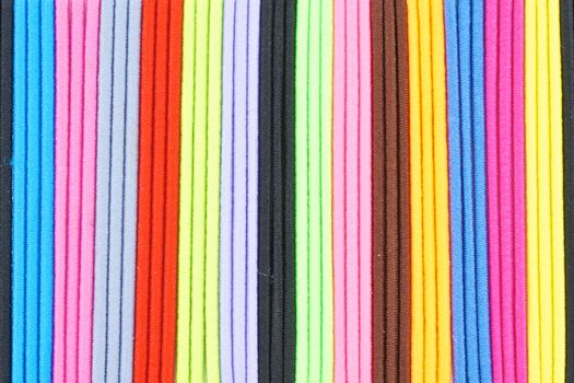 Colorful hair band made from  elastic rubber place as pattern.