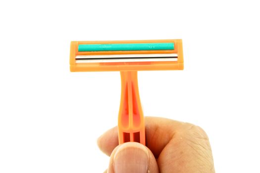 Hold orange razor for mustache on right isolated with white background.