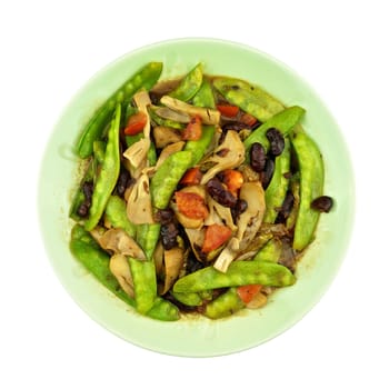 Green pea fried with red bean, tomato and mushroom isolated on white background.