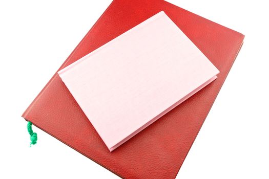 Big red and small Pink notebook stacked isolated with white background.