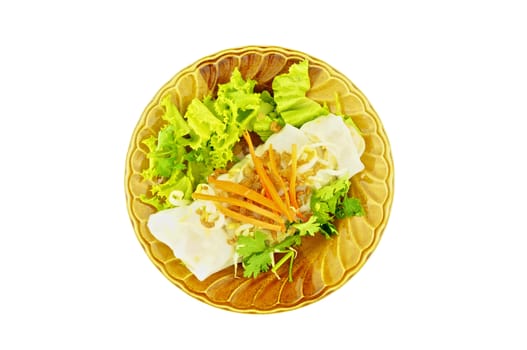 Wide rice noodle roll on dish isolated with white background.