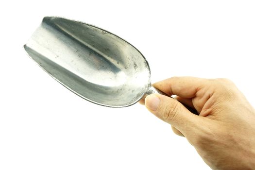 Hand hold aluminum scoop ice is tool for measuring ice isolated on white background.