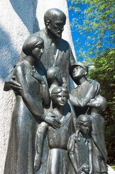 Close-up of the monument to Janusz Korczak. He was a Polish educator, children's author, paediatrician and director of an orphanage in Warsaw. On 5 August 1942 he was sent with his orphans from the Warsaw Ghetto to Treblinka death camp and murdered by the Germans in the gas chamber.