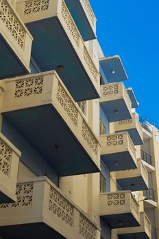 Modern residential building with concrete balconies in St Paul's Bay - San Pawl il-Baħar, Malta