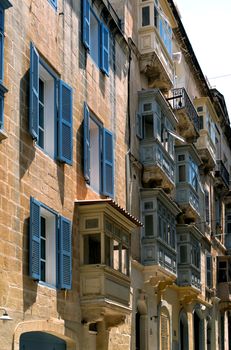 Traditional closed wooden balconies - Valetta, Malta.