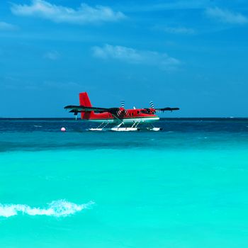 Twin otter red seaplane at Maldives