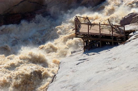 The Augrabies Falls in the Orange River showing viewing platform destroyed by flood
