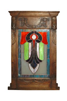 Angel stained glass artwork in wooden frame
