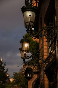 Glowing street lamp at night, Sevilla, Spain