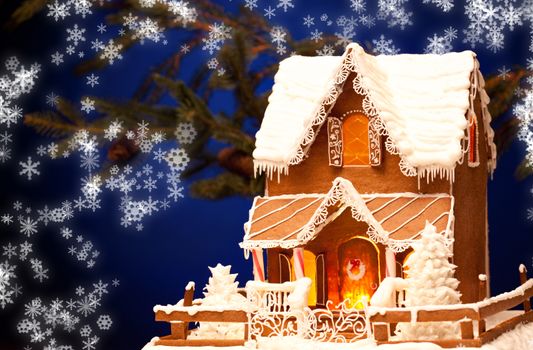 picture of gingerbread house over christmas background