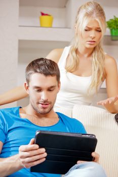 bright picture of couple with tablet PC