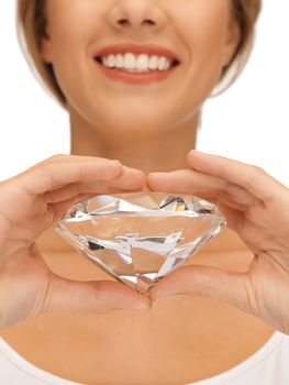 bright picture of smiling woman with big diamond