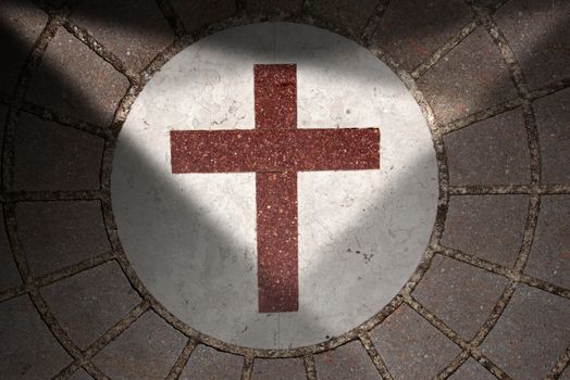 Floor with blocks of porphyry, white marble and Christian cross of red marble with shadows 