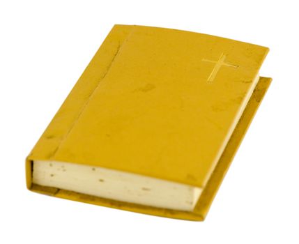 old small prayer book with yellow hard cover isolated on white background