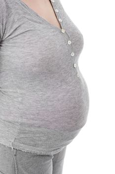 Closeup of pregnant woman at white background