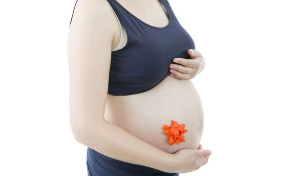 Closeup of pregnant woman at white background