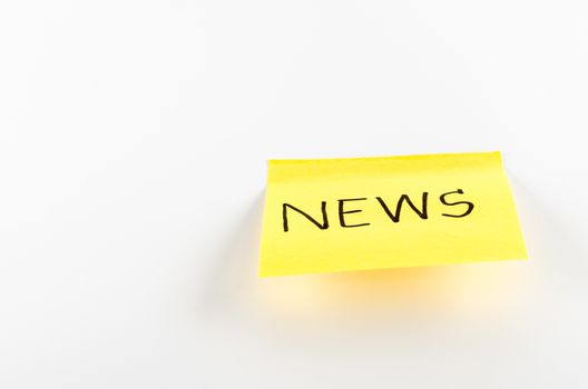 post it write news word on a white background