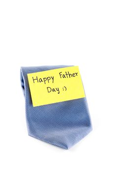 blue neck tie with card tag write happy father day word on a white background