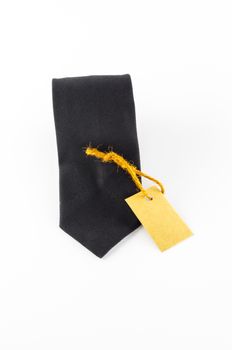 neck tie and cost tag on a white background