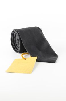 neck tie and cost tag on a white background