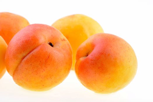 Ripe apricot on a white background