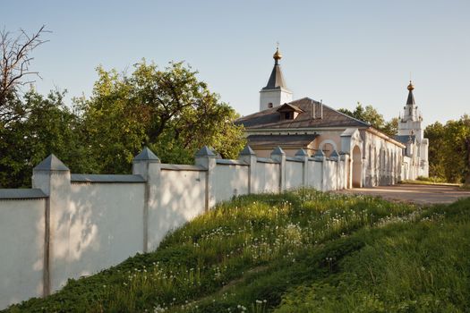 Old white stone man's monastery in the Smolensk region Russia