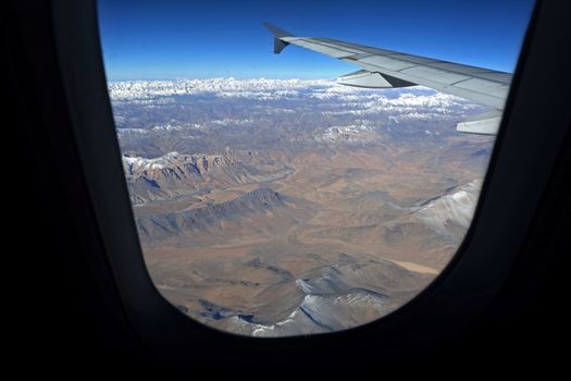 Mountain range view from aircraft window, Leh, Ladakh, India