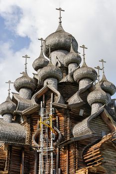 Antique wooden Church of Transfiguration at Kizhi island in Russia under reconstruction