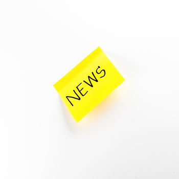 post it write news word on a white background