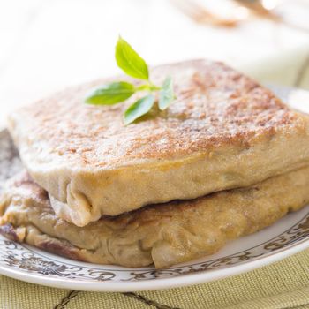 Martabak or murtabak, also mutabbaq, is a stuffed pancake is commonly found in Arab.