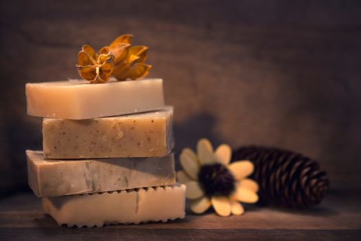 Handmade vegan soap in low light ambient setting.